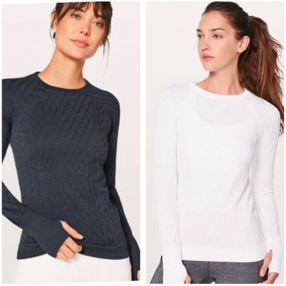 A pair of Lululemon Restless Pullover Tops White and Midnight Blue
EUC - Picture 1 of 11